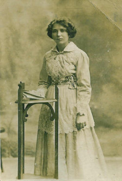 old photo of a woman in a formal pose